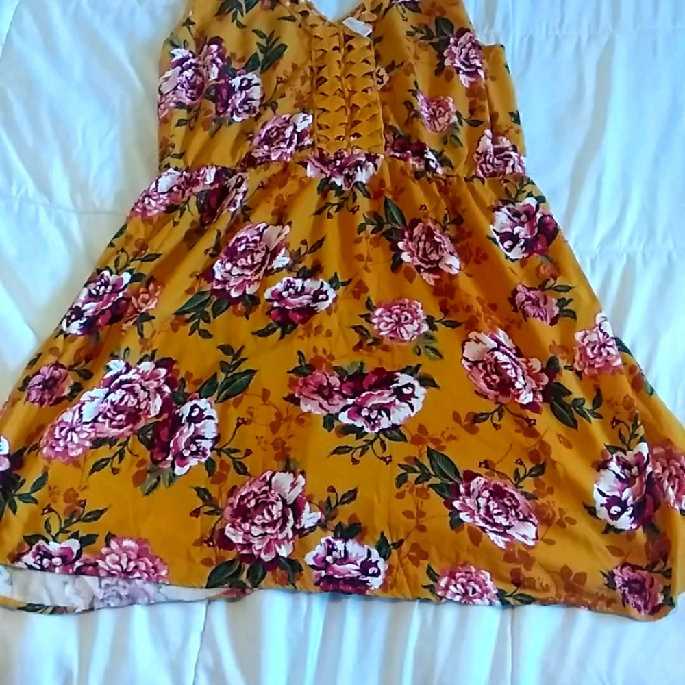 Yellow color dress flower design